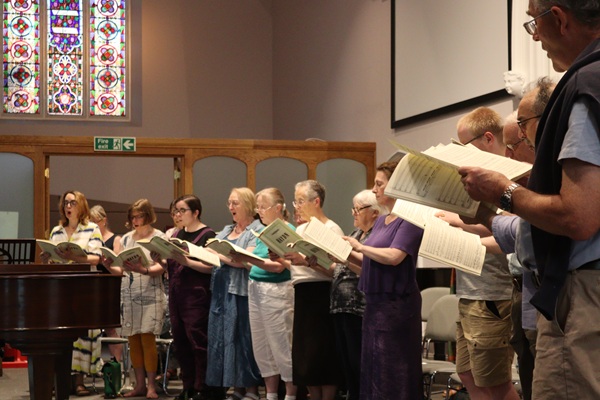 Choir standing and singing