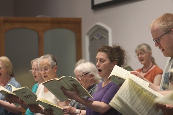 Row of people singing